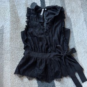 Robbi & Nikki wrap place blouse